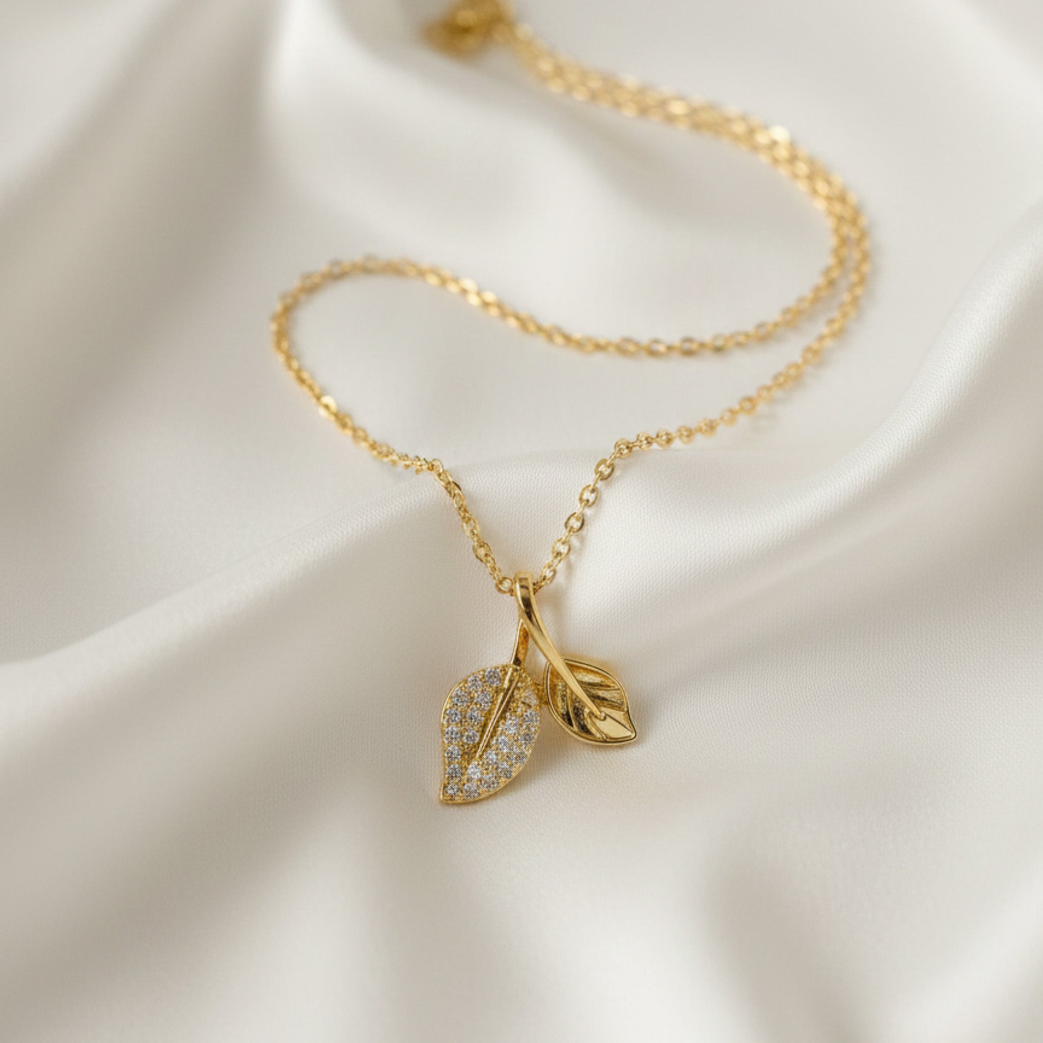 Dazzling Stone Double Leaf Chain Pendant