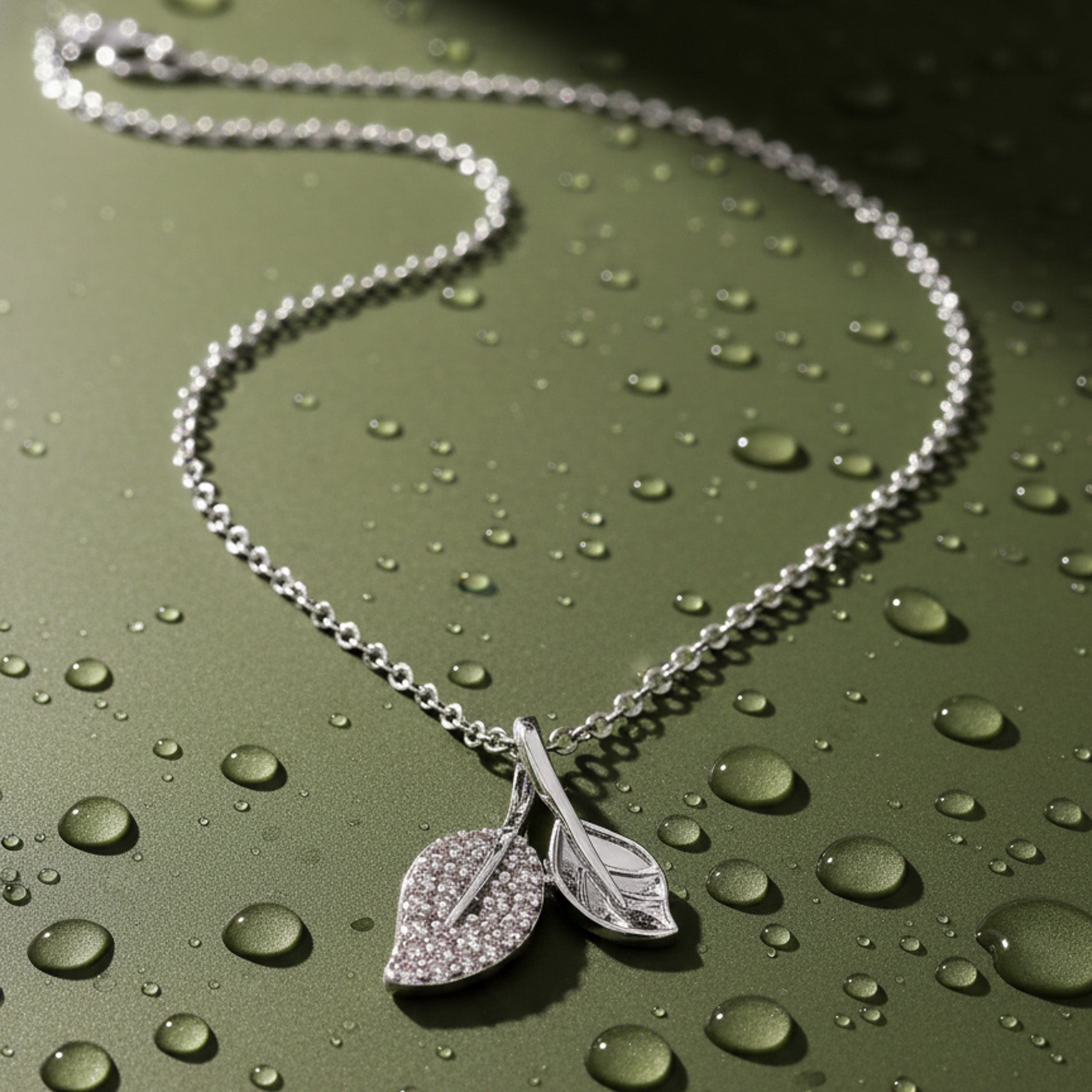 Dazzling Stone Double Leaf Chain Pendant