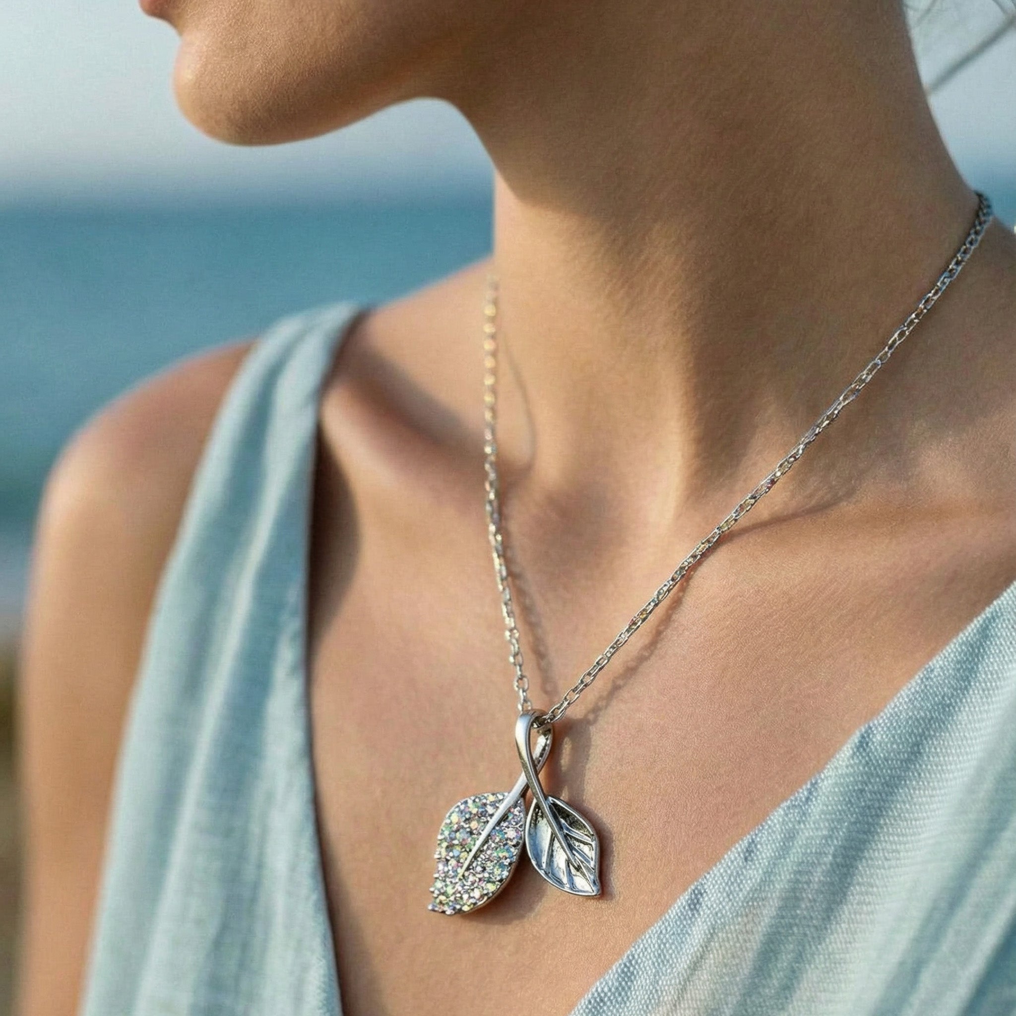 Dazzling Stone Double Leaf Chain Pendant