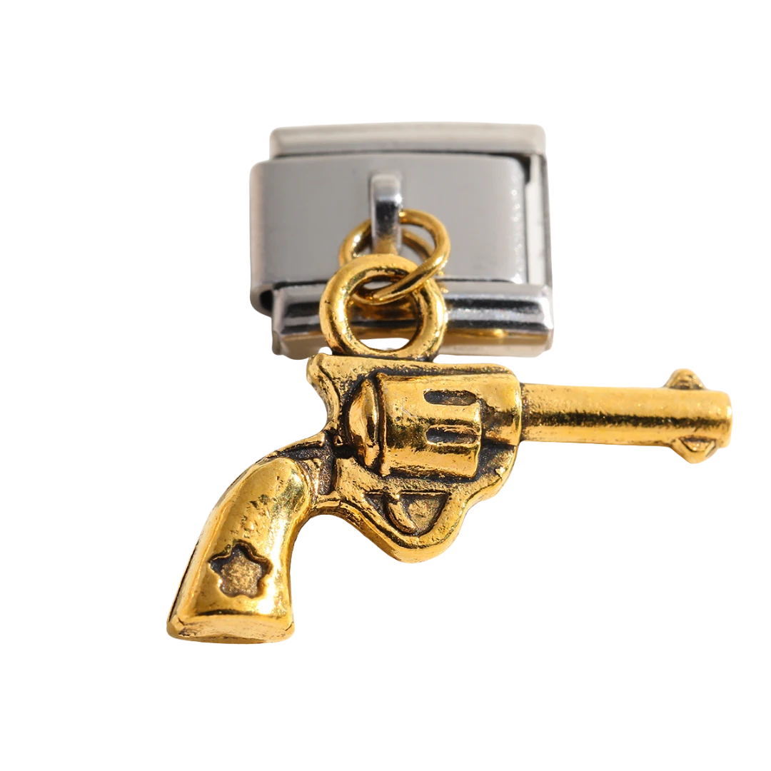 gold revolver silver charm